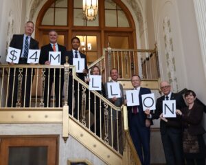 Bank Board of Directors hold $4 million signs