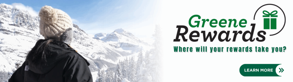 woman with hate in winter mountain range