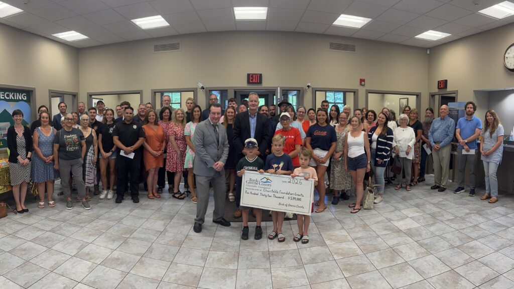 Catskill Commons branch charitable ceremony group picture with big check