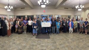 Chatham branch charitable ceremony group picture with big check