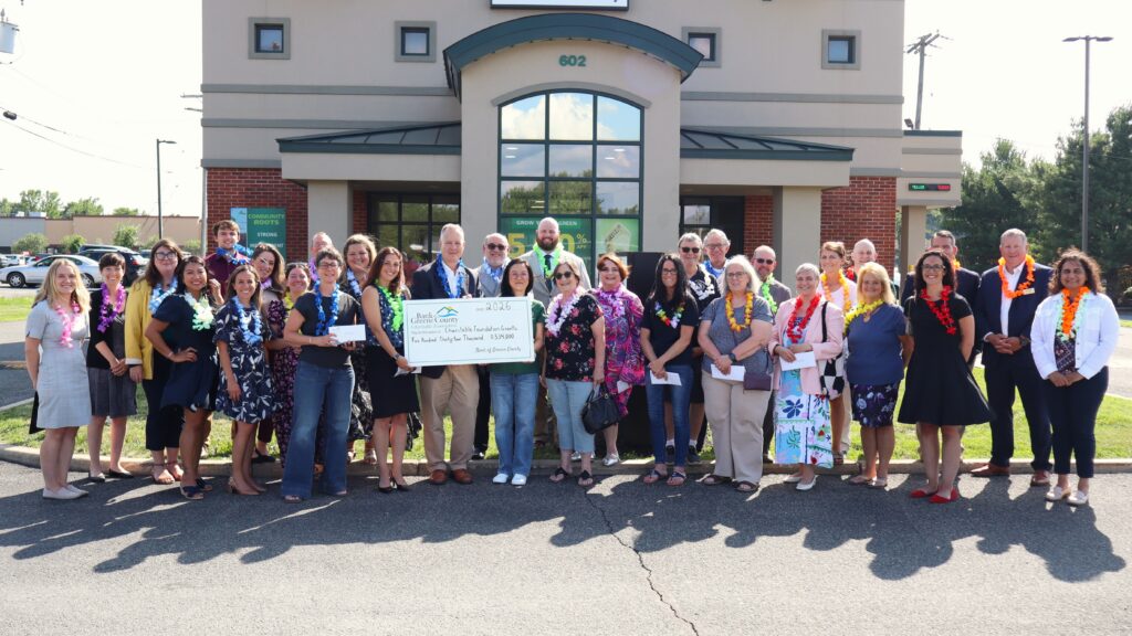East Greenbush branch charitable ceremony group picture with big check