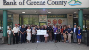 Copake branch charitable ceremony group picture with big check